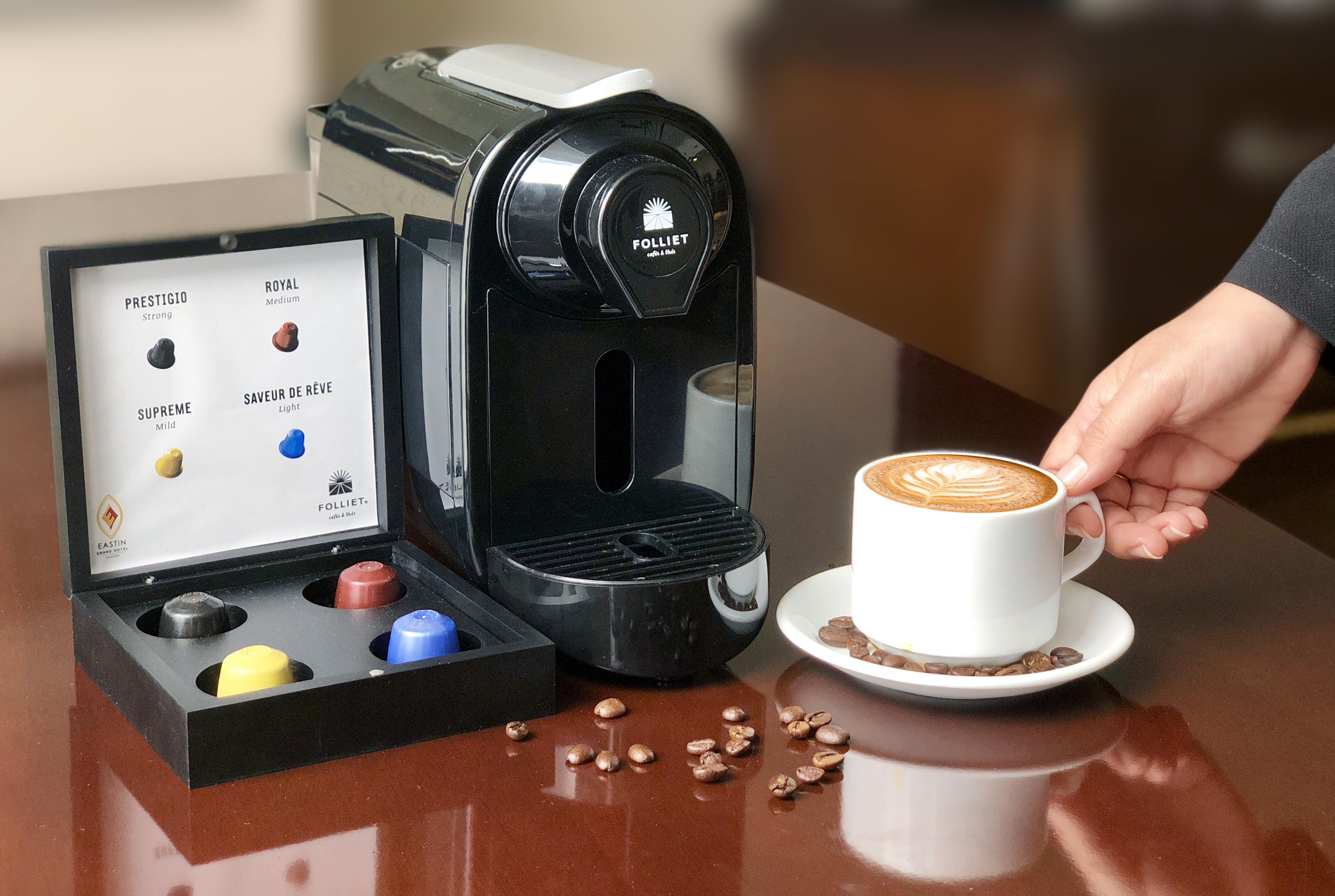 Eastin Grand Hotel Saigon Ho Chi Minh City Bagian luar foto A single serve coffee machine
