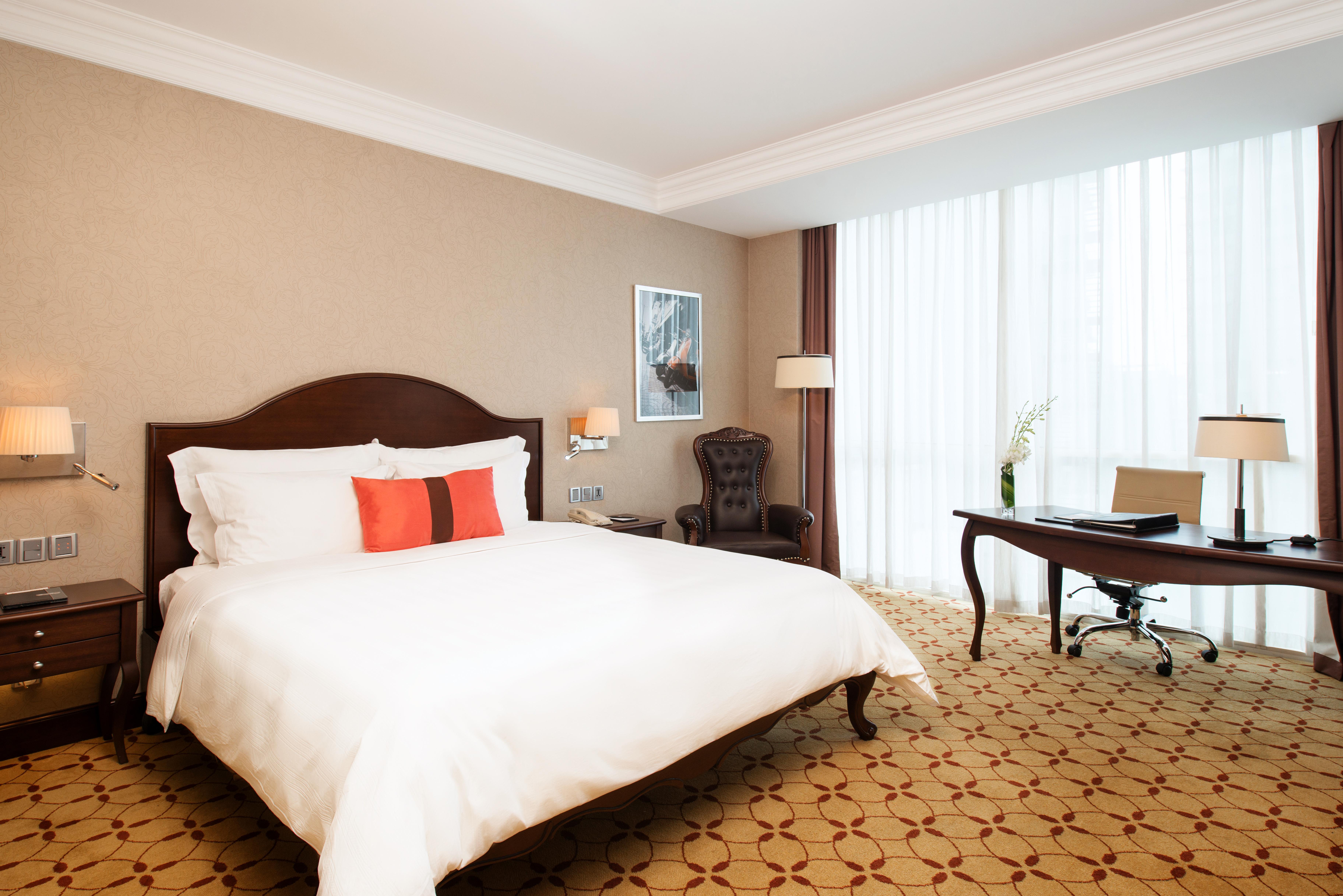 Eastin Grand Hotel Saigon Ho Chi Minh City Bagian luar foto A room at the hotel