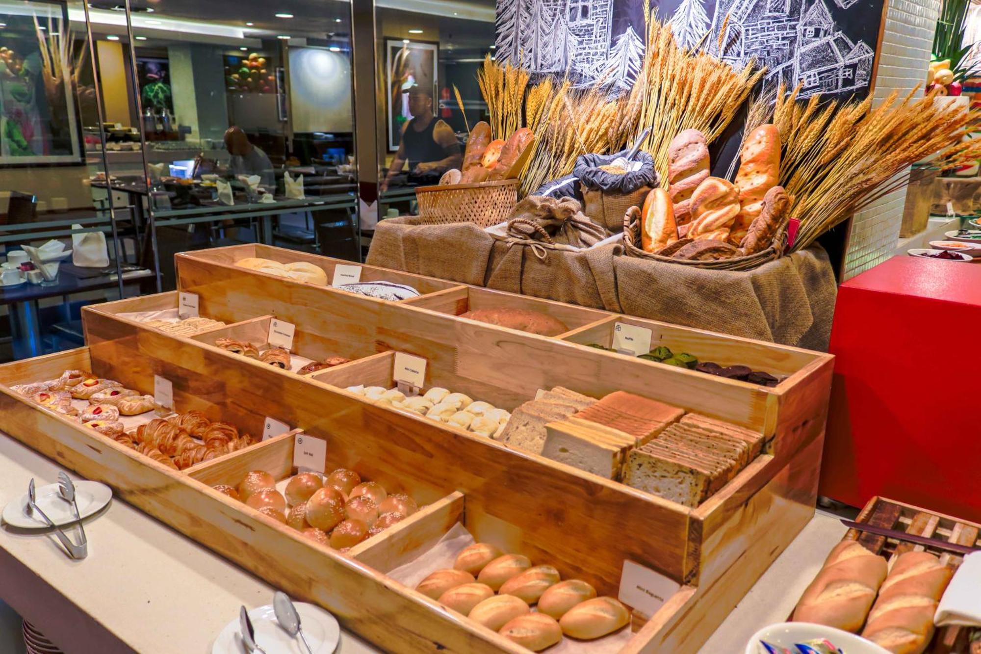 Eastin Grand Hotel Saigon Ho Chi Minh City Bagian luar foto Bread and pastry at a buffet