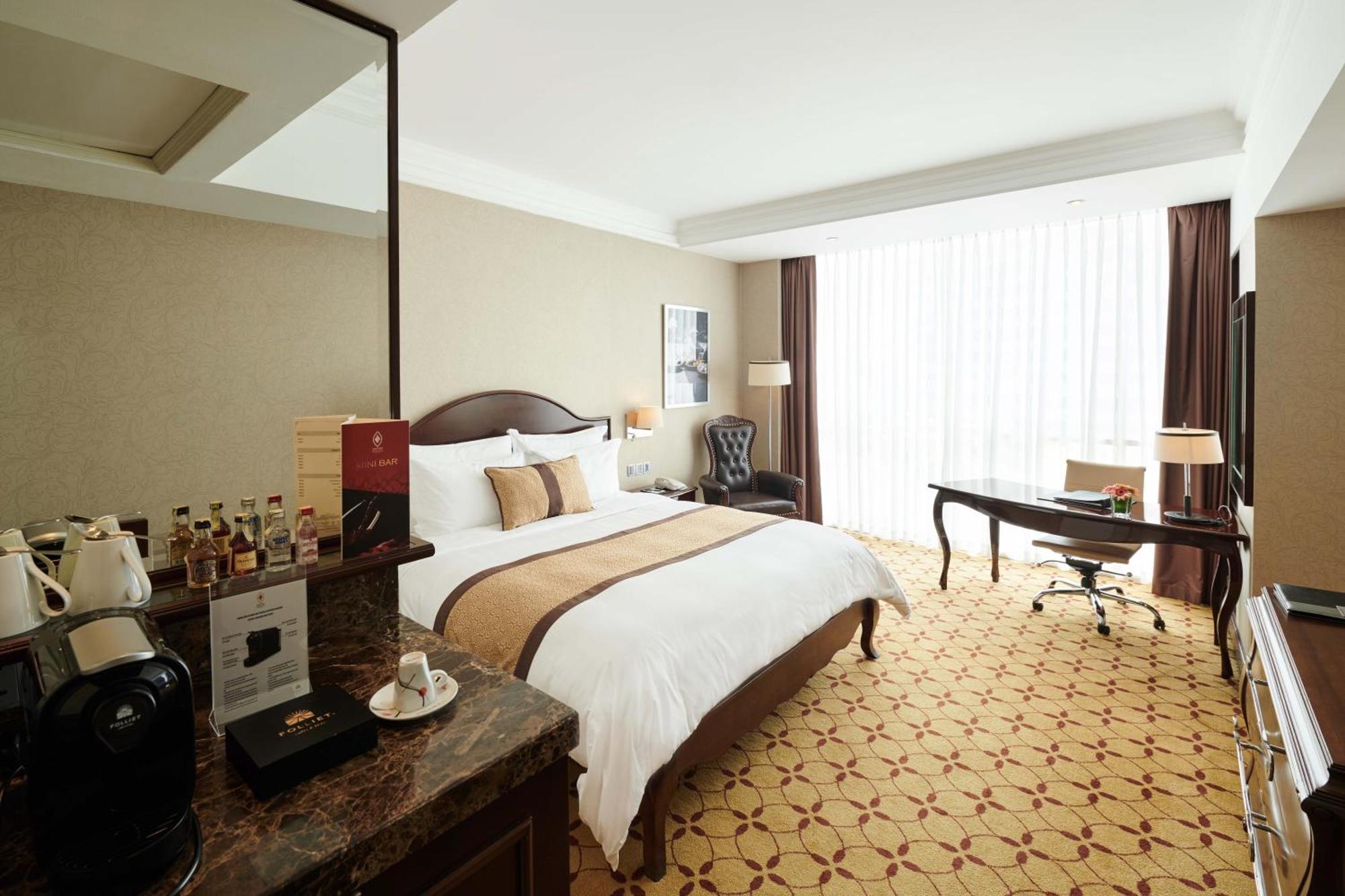 Eastin Grand Hotel Saigon Ho Chi Minh City Bagian luar foto Deluxe Room